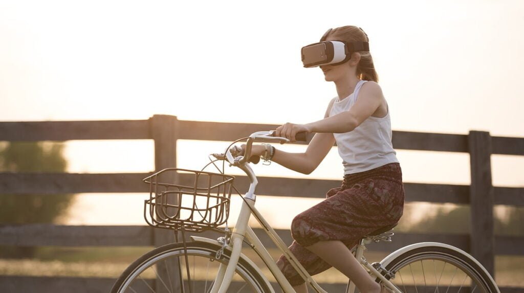 girl cycling with vr